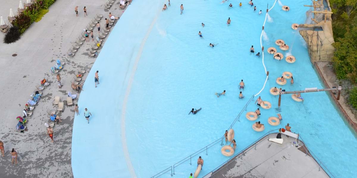 Guests floating in theme river