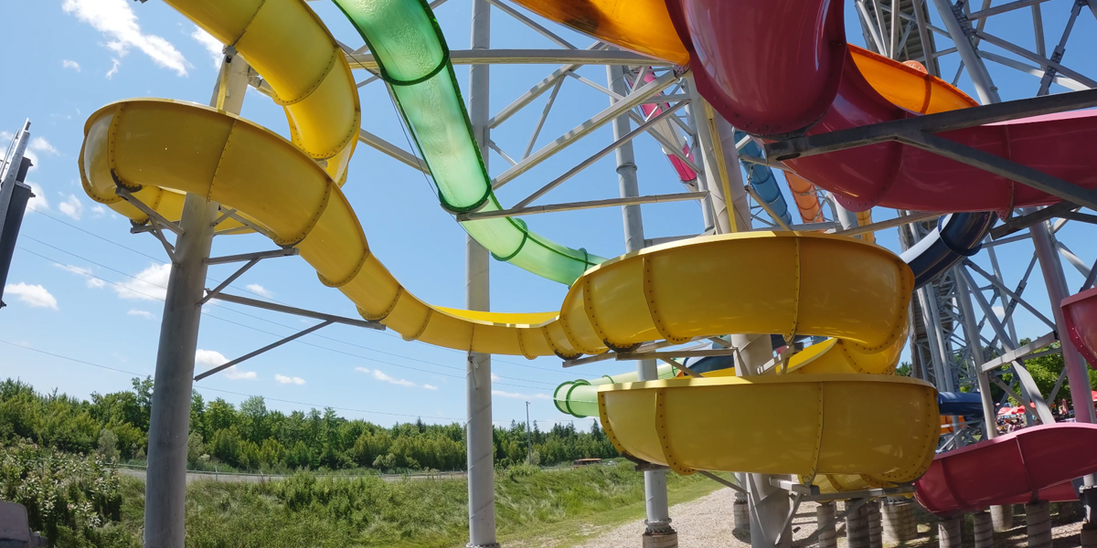 Boy shooting down speed slide